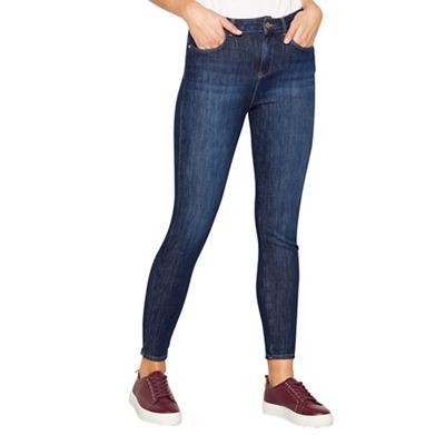 Blue zip pocket skinny jeans