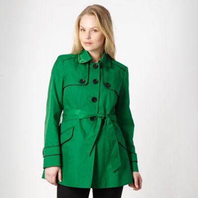 Bright green short tipped mac coat                                                                                              