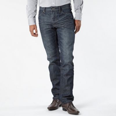 Dark blue washed and crinkled jeans