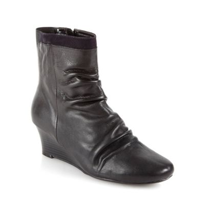 Black leather mid wedge ankle boots                                                                                             