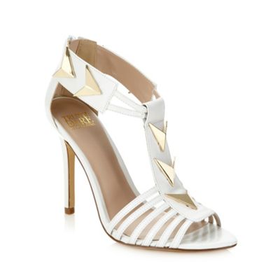 White triangular studded high heeled sandals                                                                                    