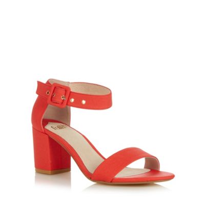 ... faith mid heels have a dark orange design with a block heel and a