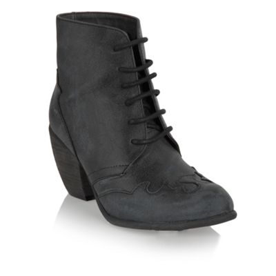 Black worn leather ankle boots