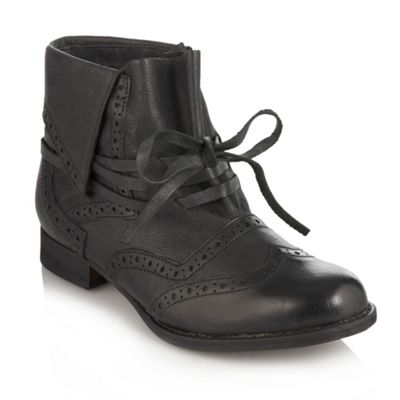 Black perforated ankle boots