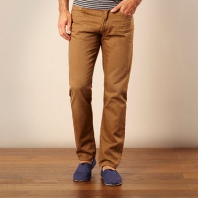 Dark tan coloured tapered fit jeans