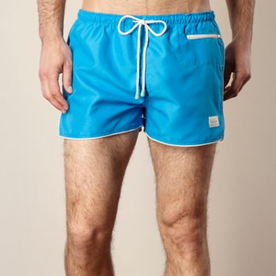 Turquoise contrasting trimmed board shorts                                                                                      
