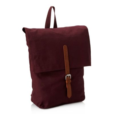 Maroon canvas backpack                                                                                                          