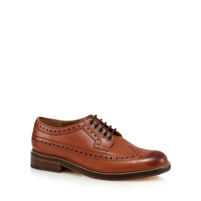 Designer dark red leather brogue shoes                                                                                          
