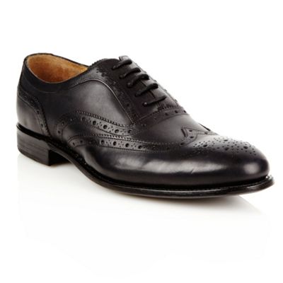 Designer black leather brogues