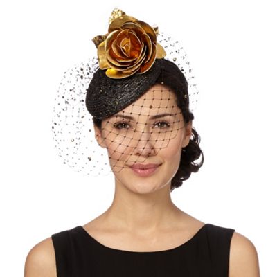 orange hats and fascinators