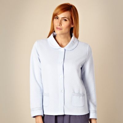 Light blue quilted bed jacket                                                                                                   