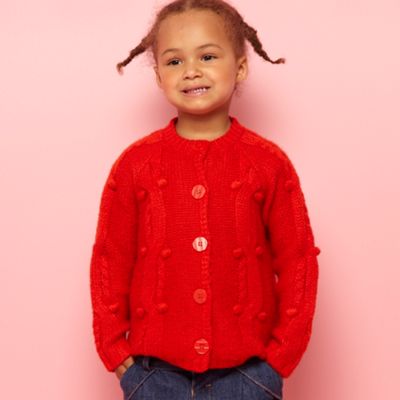 Designer girl's orange bobble knitted cardigan                                                                                  