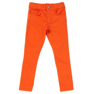 Girls orange stretch skinny jeans