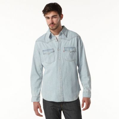 Blue long sleeved denim shirt
