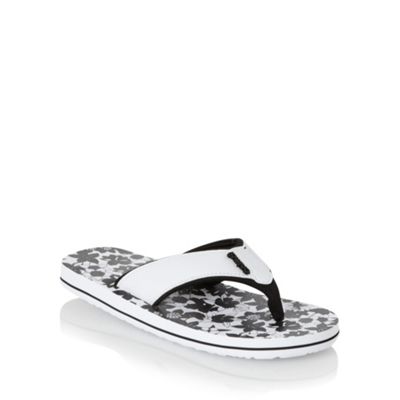 Black floral printed flip flops                                                                                                 