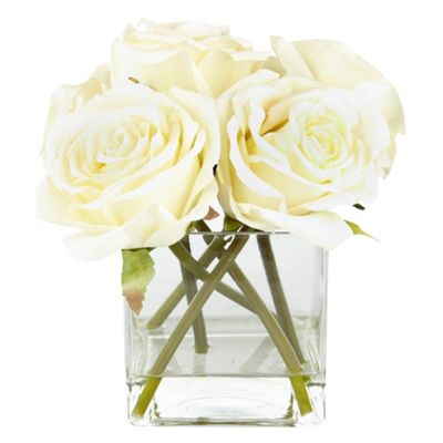 Cream roses in square vase
