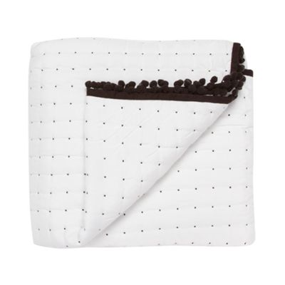 Designer white spotted throw                                                                                                    