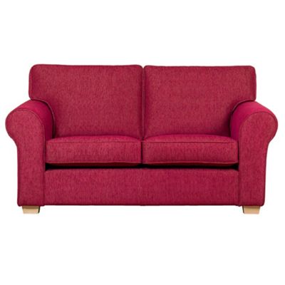 Large pink Aster sofa bed with light wood feet