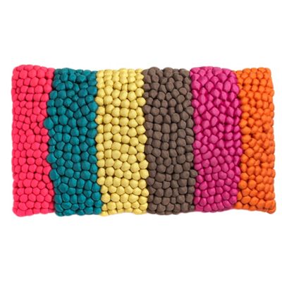 Pink bobbled cushion