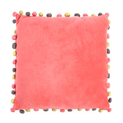 Coral pompom cushion