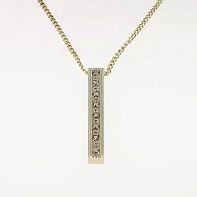 Ladies 9ct white gold diamond set pendant and