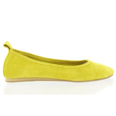 Yellow suede pumps