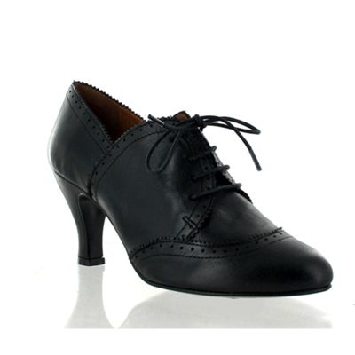 Black leather heeled brogue with lace fastening