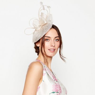 Debut - Light gold 'Bon Bon' swoop fascinator