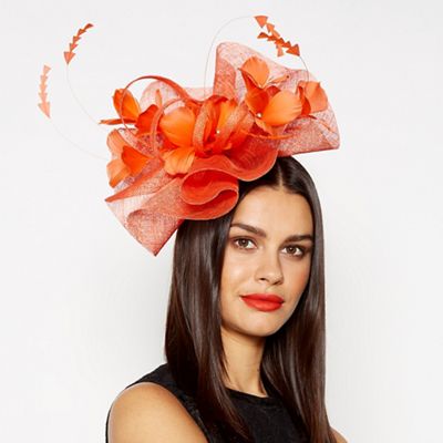 orange hats and fascinators