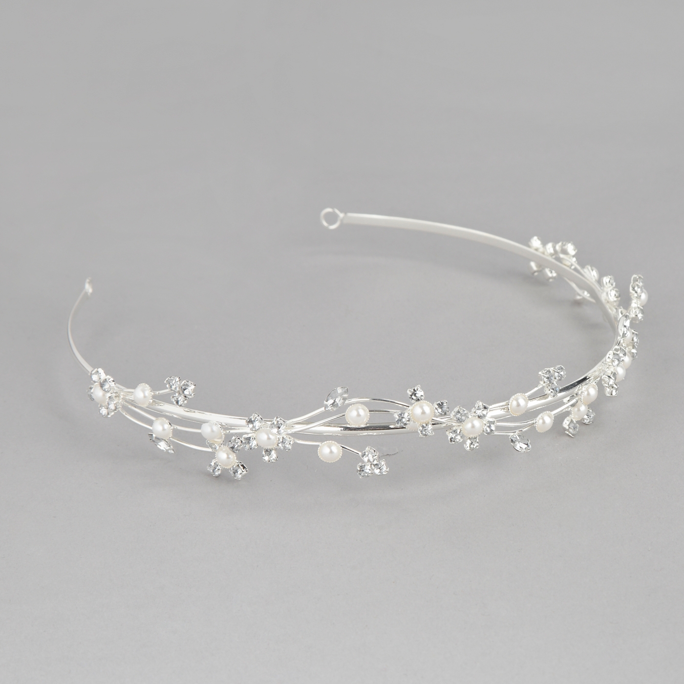 Girls silver coloured pearl head band