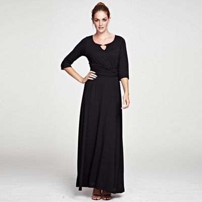 Black maxidress with gold bar in clever fabric
